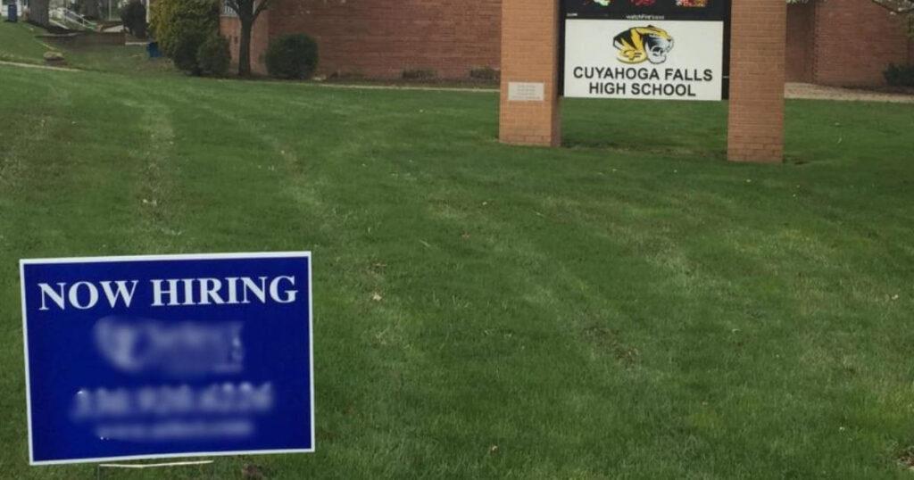 manufacturing hiring sign in high school lawn