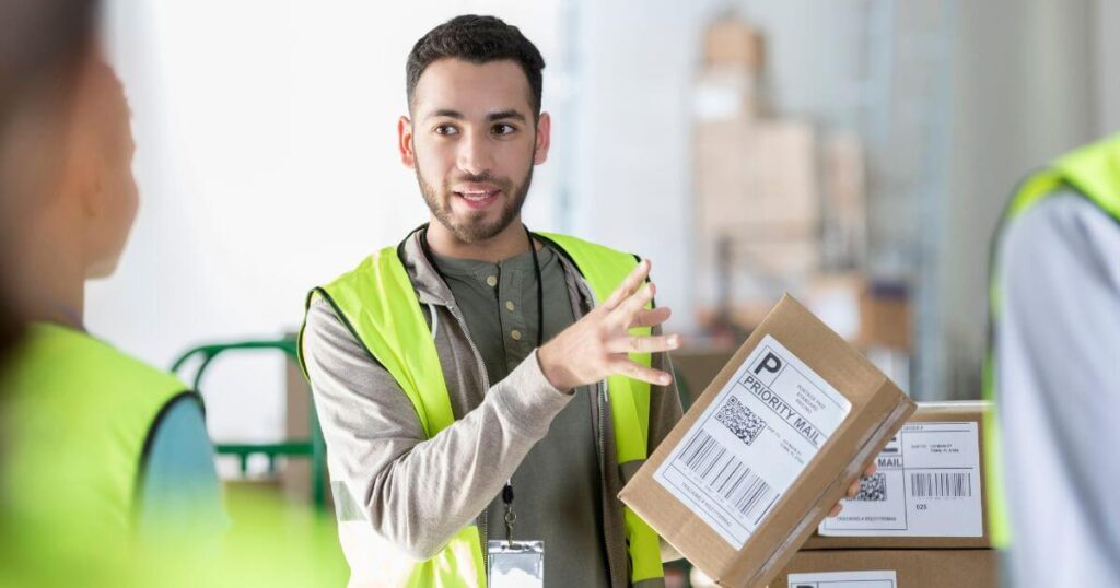 warehouse trainer instructing employees