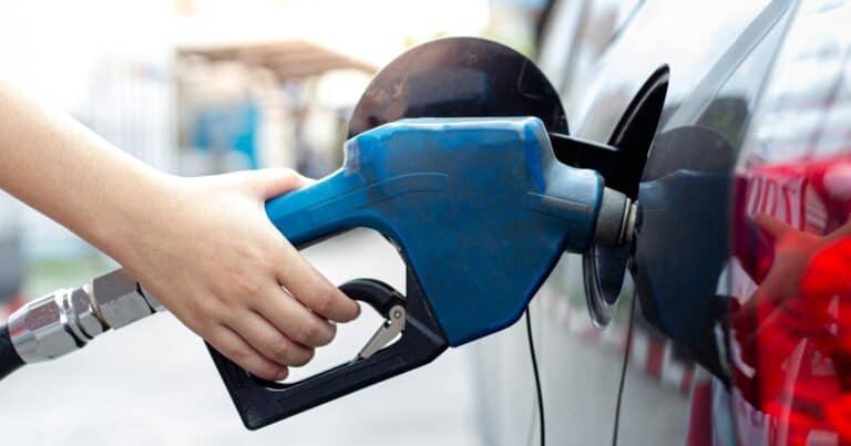 person pumping gas