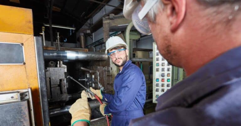 manufacturer worker with his mentor